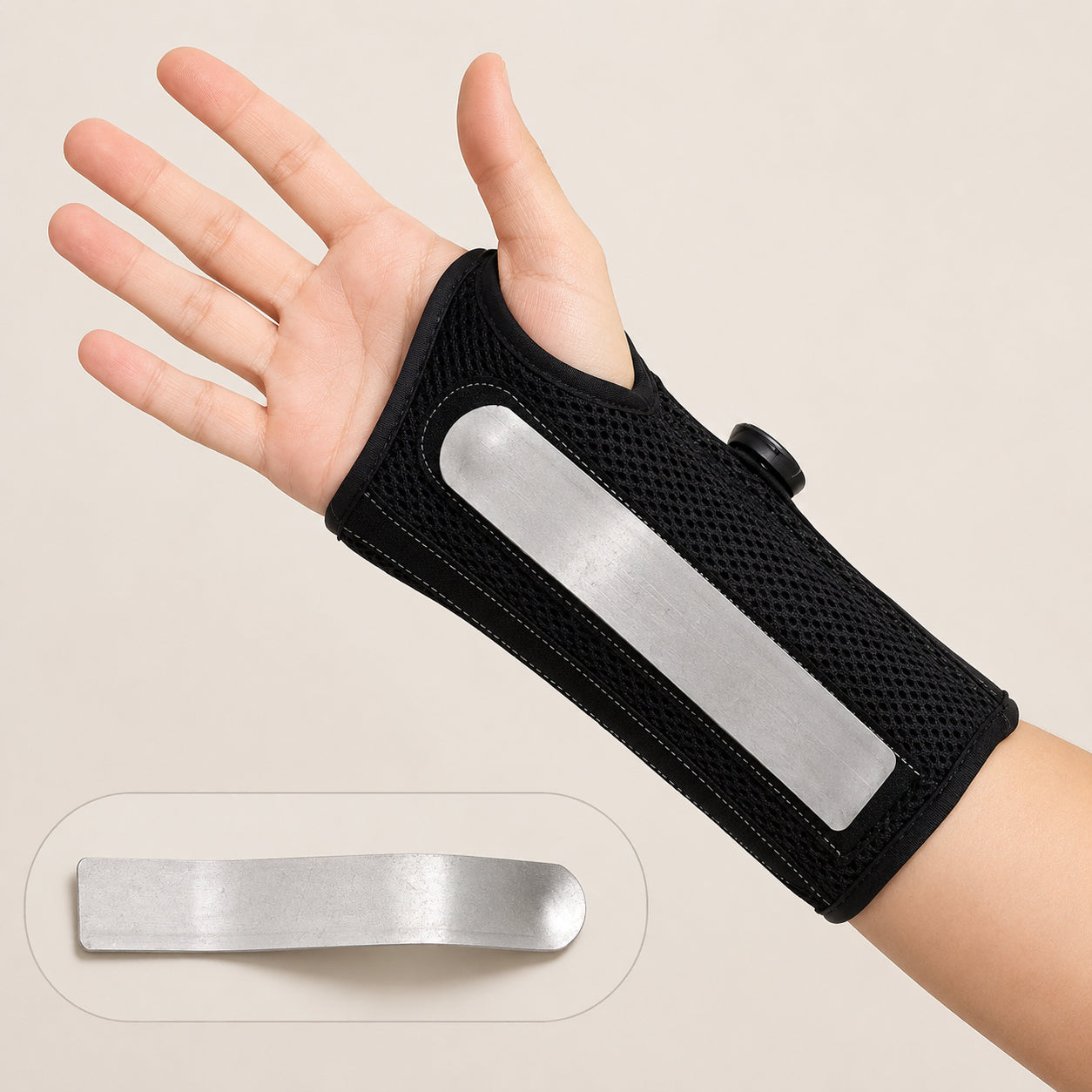 Handledsstöd med vridspänne och avtagbar aluminiumskena för extra stöd och stabilisering av handleden.
