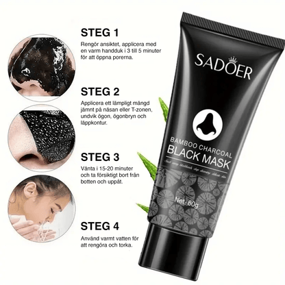 Ansiktsmask med bamboo charcoal applicerad i ansiktet