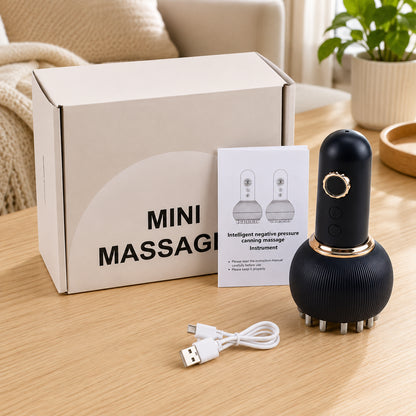Elektrisk Gua Sha massageapparat med USB-laddningskabel, förpackning och bruksanvisning i hemmamiljö.