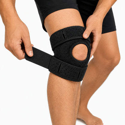 Justerbart knästöd med patellaöppning och kompressionsrem för stabilitet, avlastning och bekväm passform.