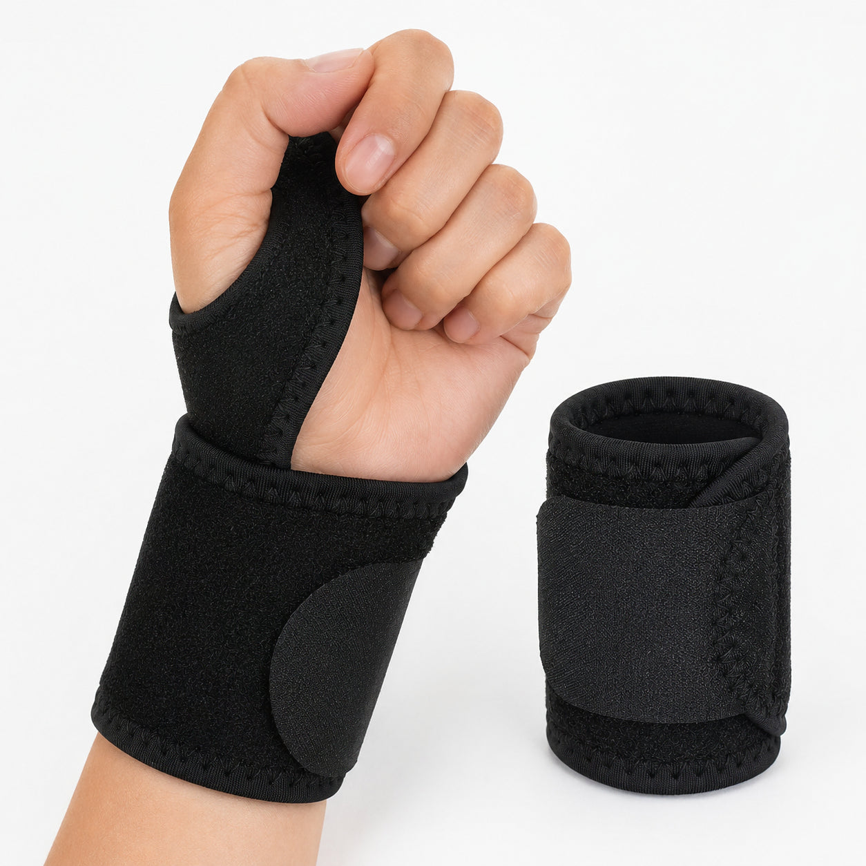 Ortopediskt handledsstöd med tumstabilisering som ger stöd och avlastning för handled och tumme.