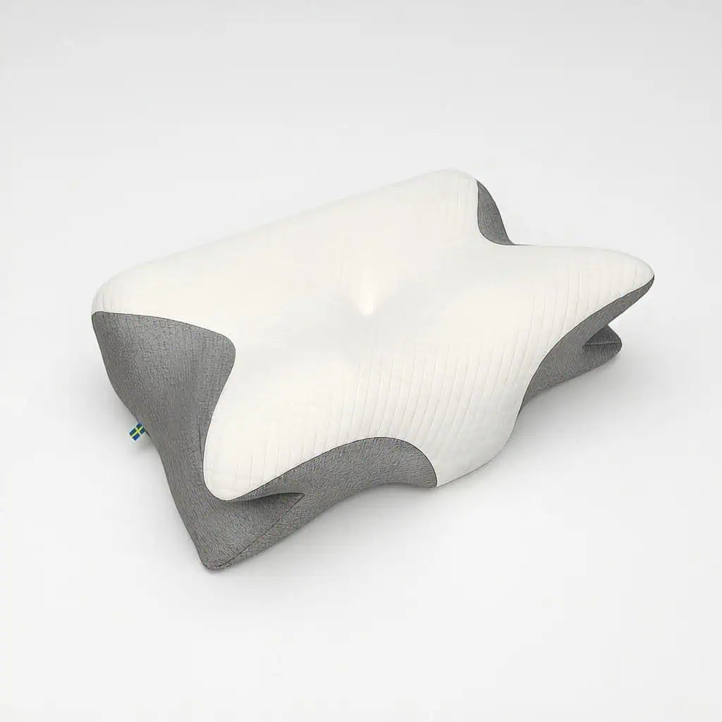 Ergonomiskt utformad kudde med vågform som följer huvudets och nackens naturliga läge